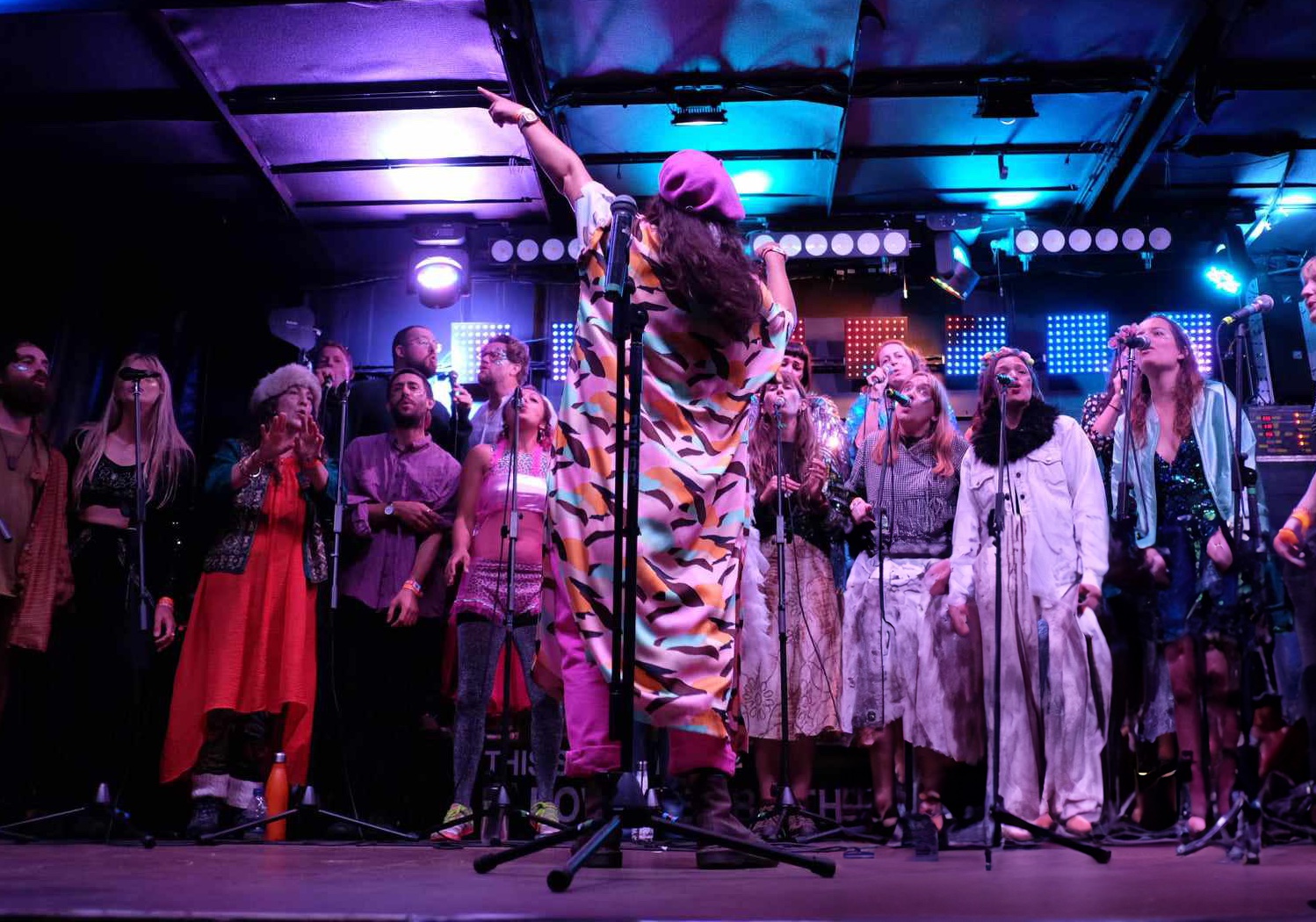 young man side profile having beard trimmed with scissors